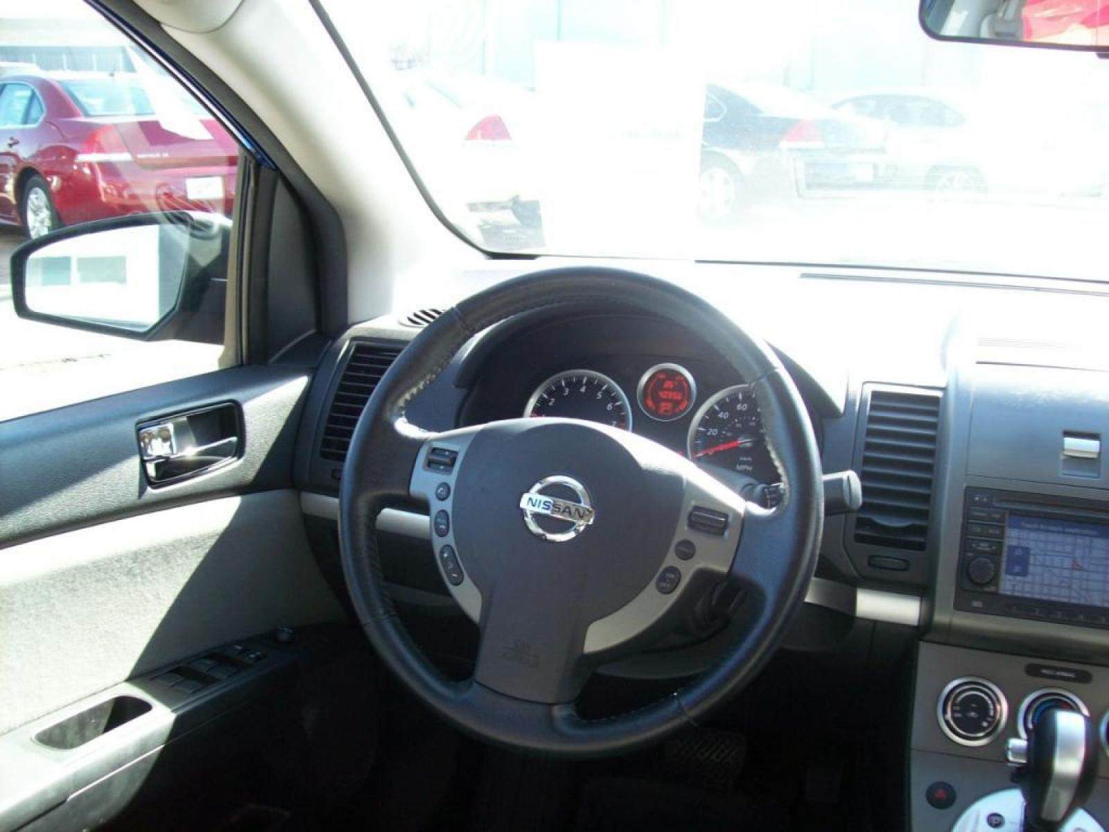 2011 Blue /Gray Nissan Sentra 2.0; 2.0 S; 2.0 SL; 2.0 SR (3N1AB6AP0BL) with an L4, 2.0L engine, Automatic transmission, located at 220 West South St., Hastings, NE, 68901, (402) 461-3161, 40.582653, -98.383919 - This is a Special Edition! Leather, AM-FM-CD, Navigation System, Satellite Radio - XM, Front Wheel Drive, Cruise Control, Power Windows and Locks, Rear Defrost, Power Driver's Seat, Split Back Seat, Alloy Wheels. - Photo #5