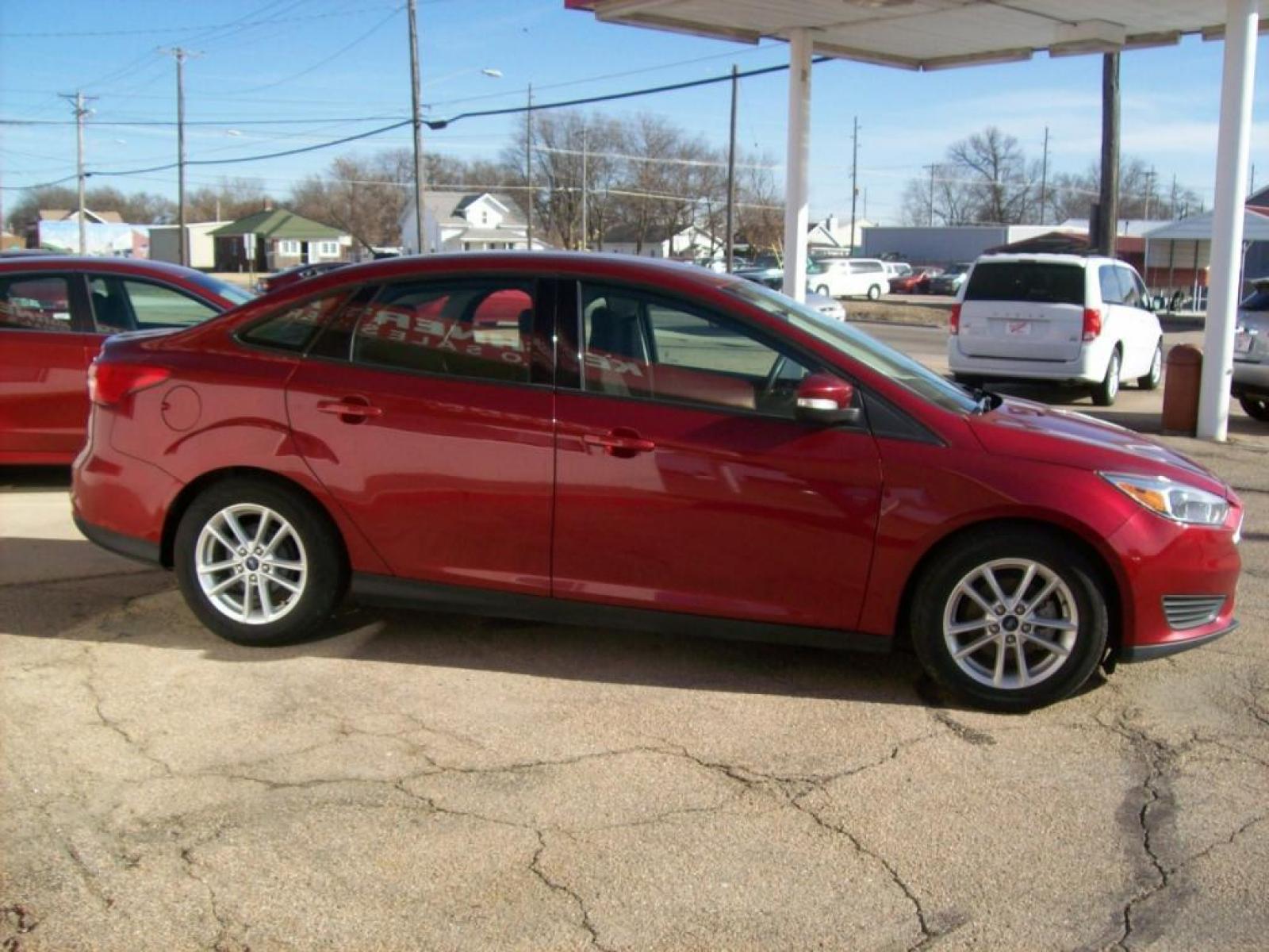 2015 Red /Graphite Grey Ford Focus SE (1FADP3F29FL) with an L4, 2.0L; FFV engine, Automatic transmission, located at 220 West South St., Hastings, NE, 68901, (402) 461-3161, 40.582653, -98.383919 - Great Gas Mileage, Back-up Camera, 25,xxx Miles - Photo #8