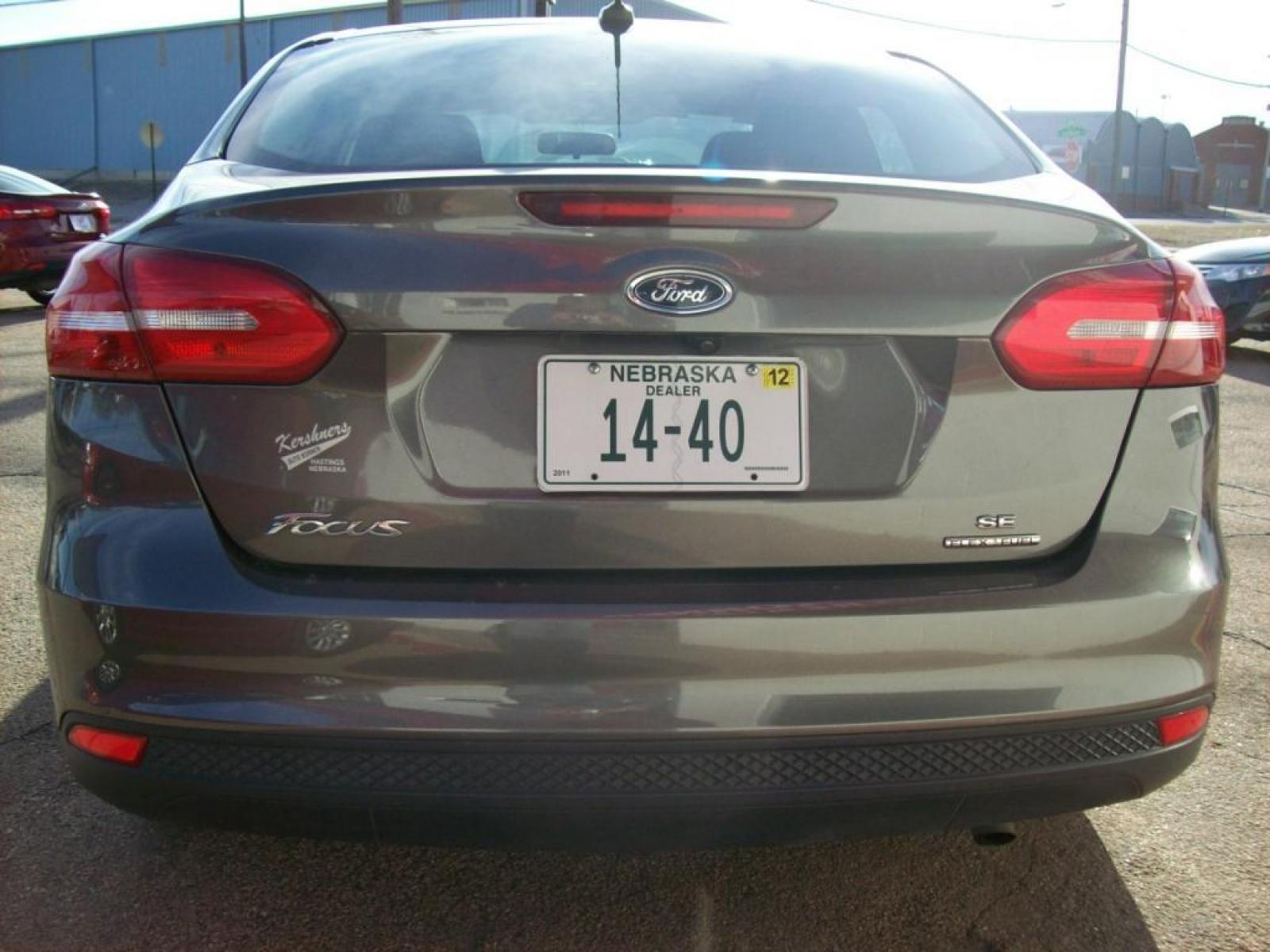 2015 Grey /Graphite Grey Ford Focus SE (1FADP3F21FL) with an L4, 2.0L; FFV engine, Automatic transmission, located at 220 West South St., Hastings, NE, 68901, (402) 461-3161, 40.582653, -98.383919 - Great Gas Mileage, Back-up Camera, 21,xxx Miles - Photo #10