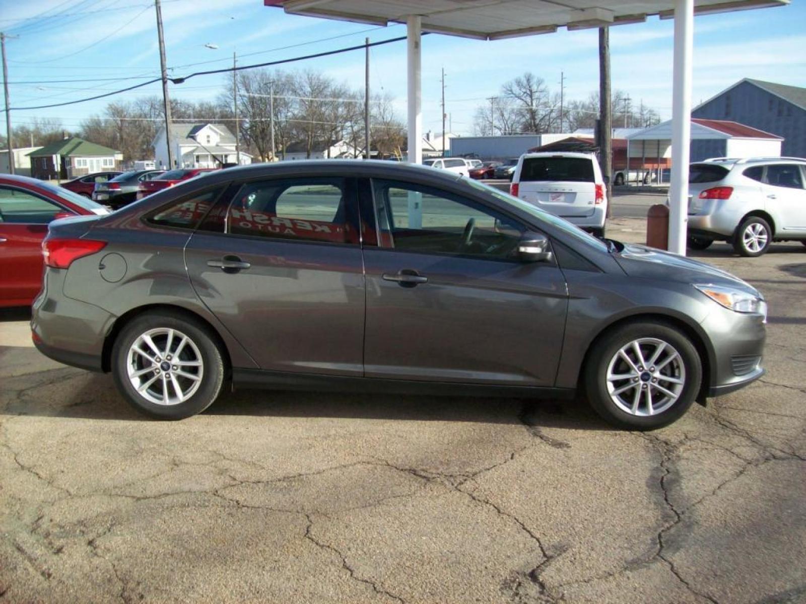 2015 Grey /Graphite Grey Ford Focus SE (1FADP3F21FL) with an L4, 2.0L; FFV engine, Automatic transmission, located at 220 West South St., Hastings, NE, 68901, (402) 461-3161, 40.582653, -98.383919 - Great Gas Mileage, Back-up Camera, 21,xxx Miles - Photo #8